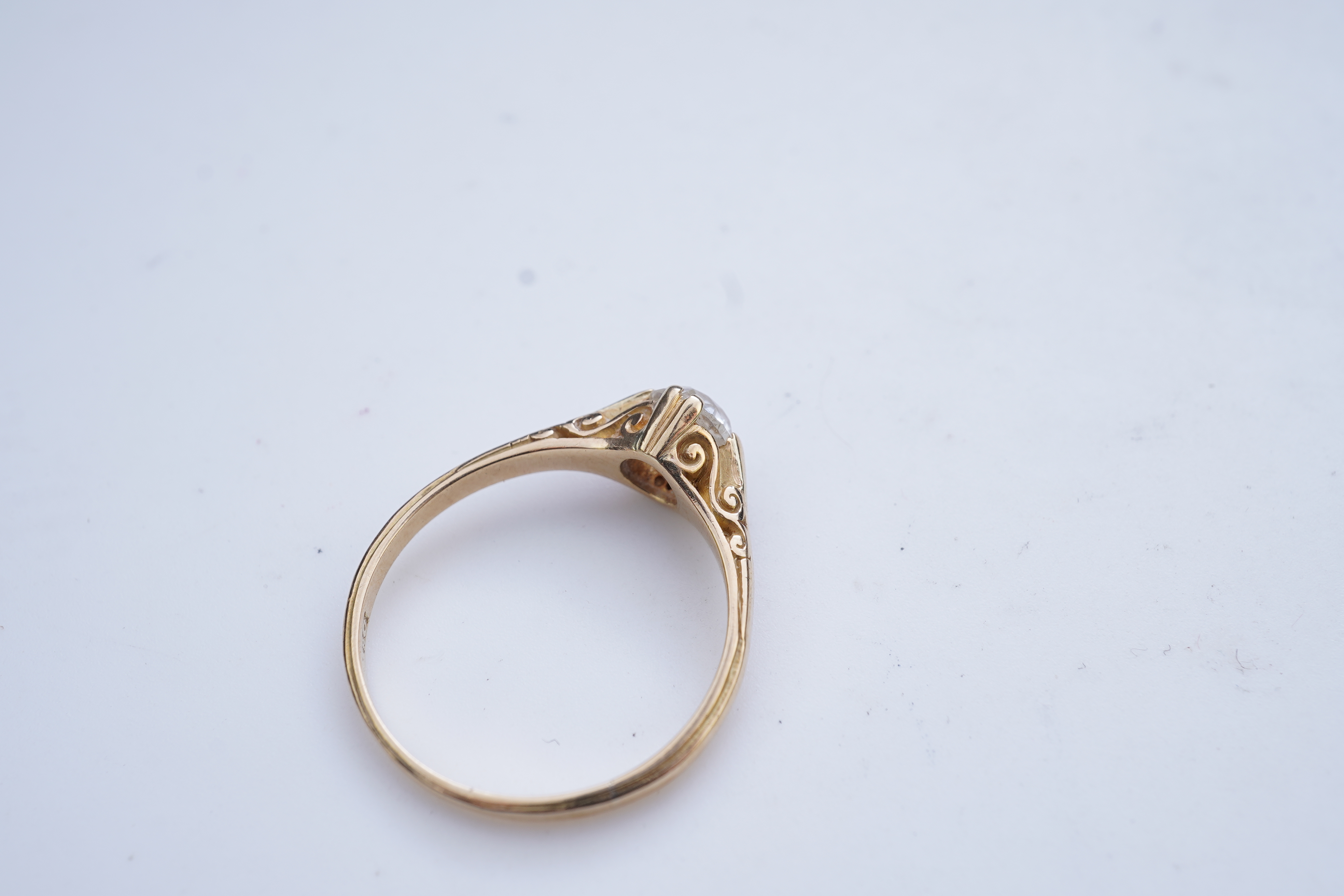 A gold and diamond ring, early 20th century